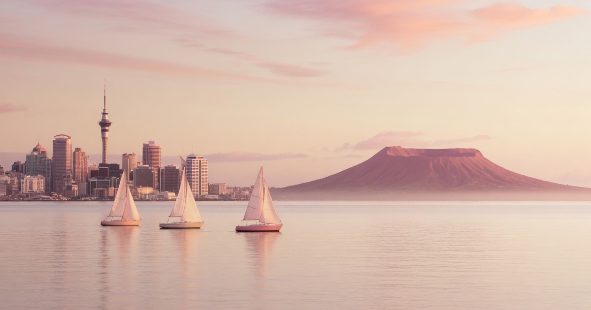 Auckland harbour and skyline with Rangitoto at golden hour