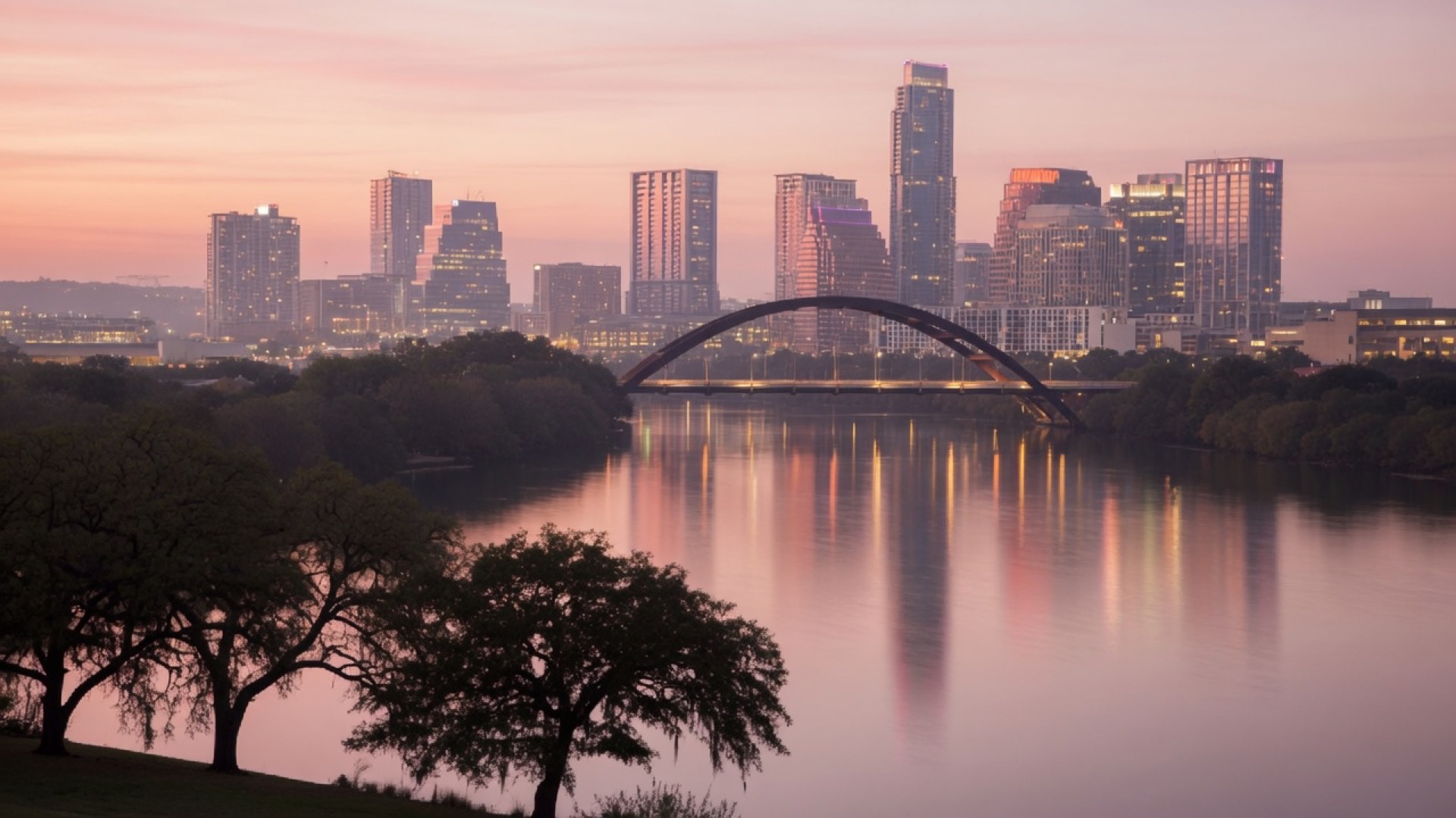 Lake and skyline over Austin at dusk