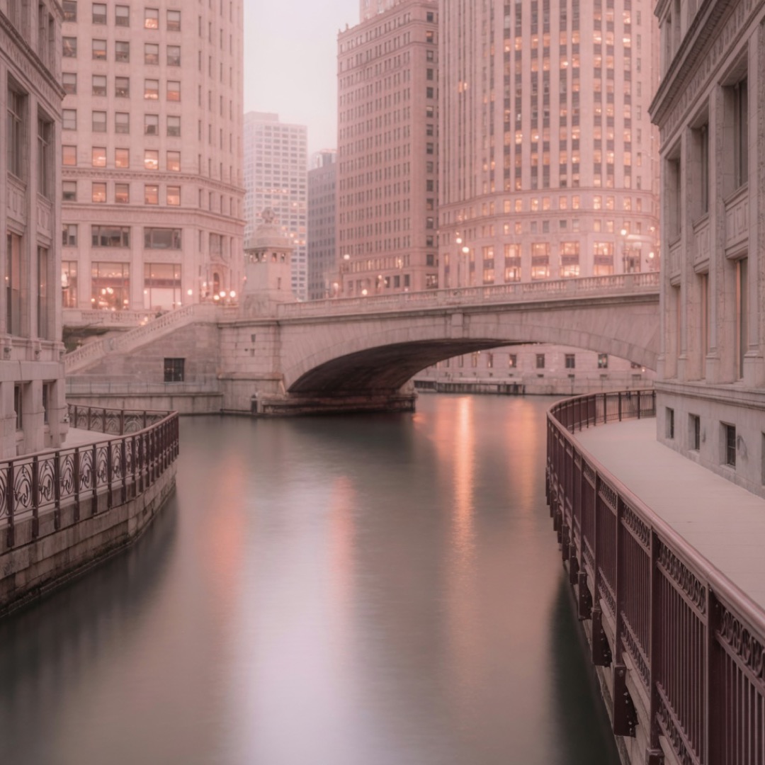 River walkway along the Chicago River with bridges