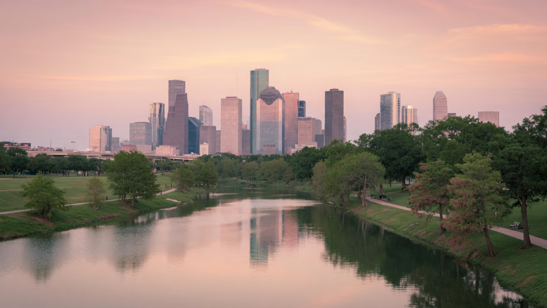 Bayou path and skyline at dusk in Houston