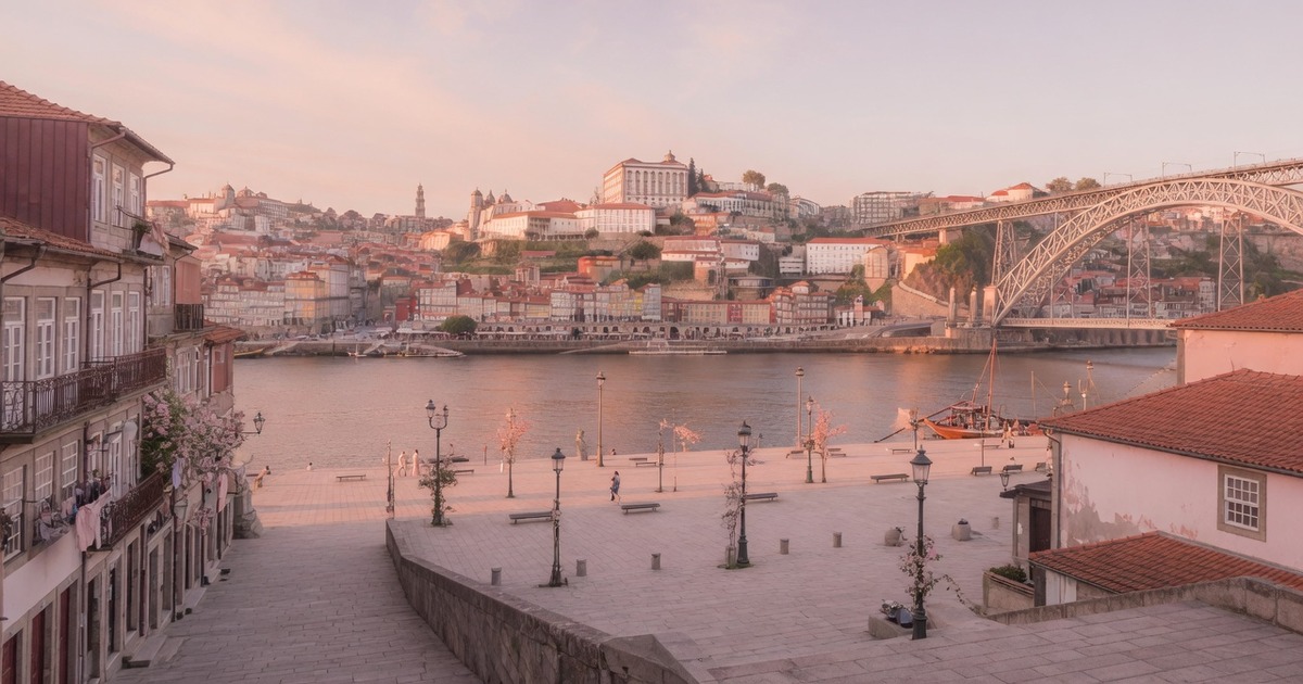Soft Blush hero for Porto — soft light, public place scale, no faces