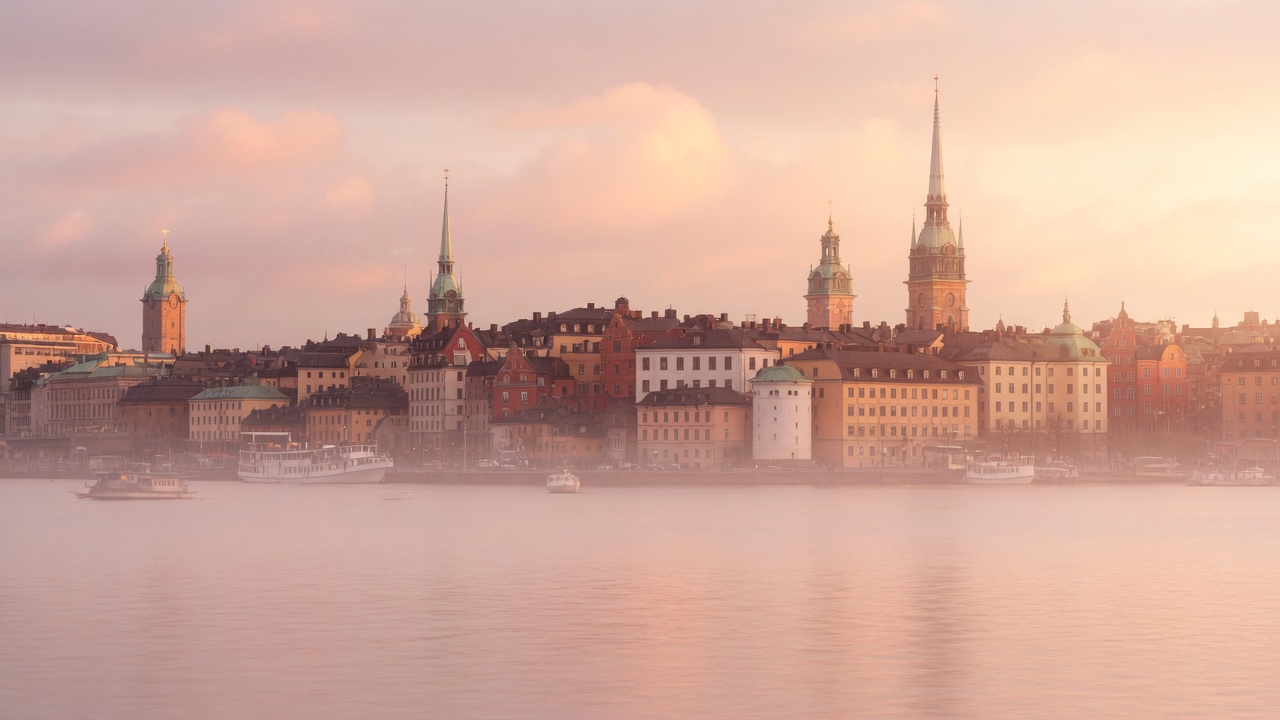 Stockholm golden hour over the water with Gamla Stan's skyline